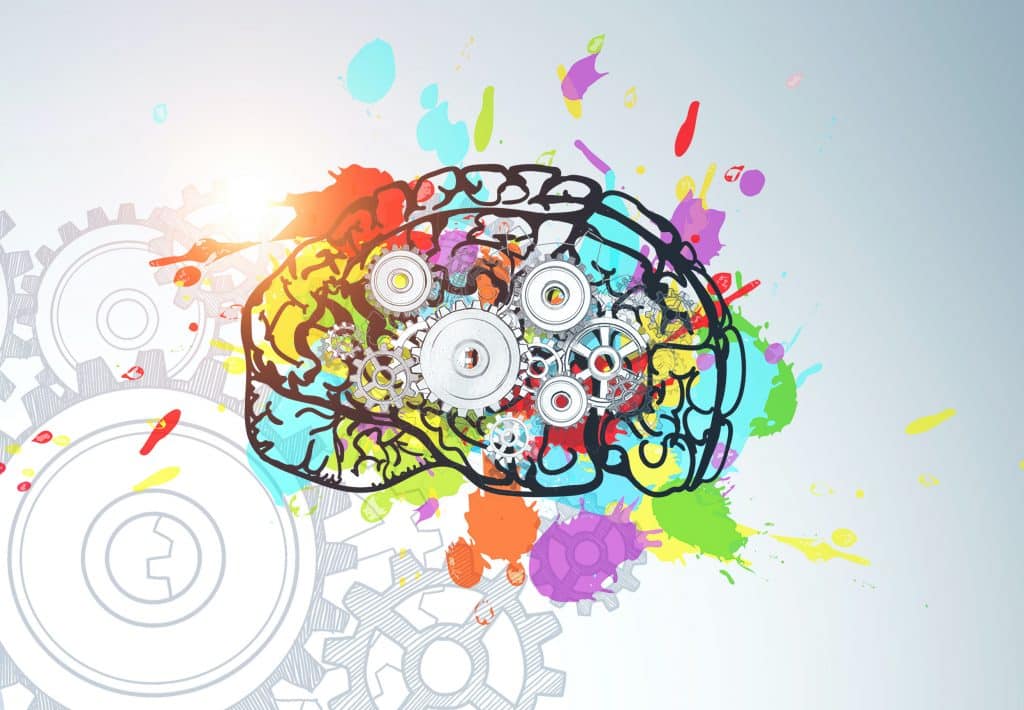 concrete wall with colorful brain with gears drawn on it. Concept of brainstorming and education.